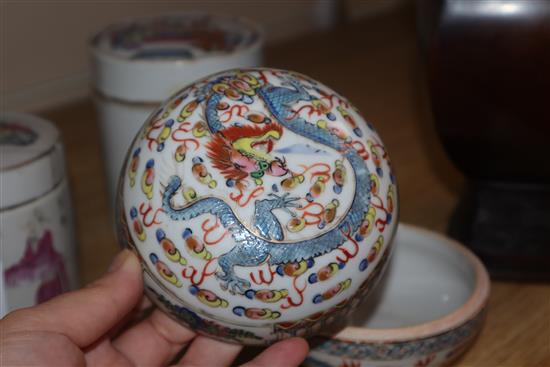 Two Chinese famille rose lidded pots and a circular pot